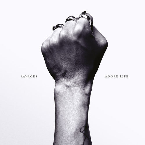 the album cover for Savages - Adore Life