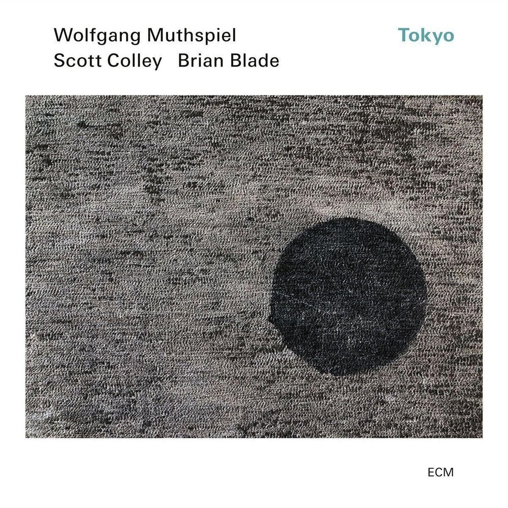 the album cover for Wolfgang Muthspiel / Scott Colley / Brian Blade - Tokyo