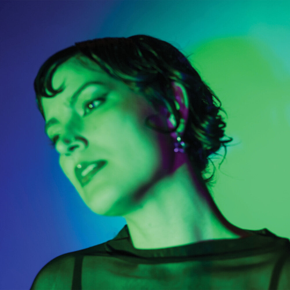 the album cover for MAURA WEAVER - Strange Devotion