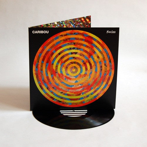 the album cover for Caribou - Swim