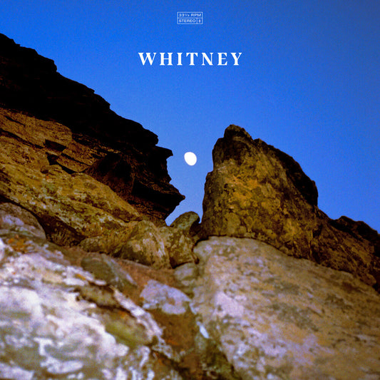 the album cover for Whitney - Candid