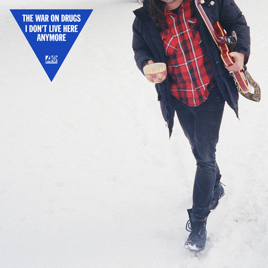 the album cover for The War On Drugs - I Don’t Live Here Anymore [Indie Exclusive Limited Edition Translucent Blue 2LP]