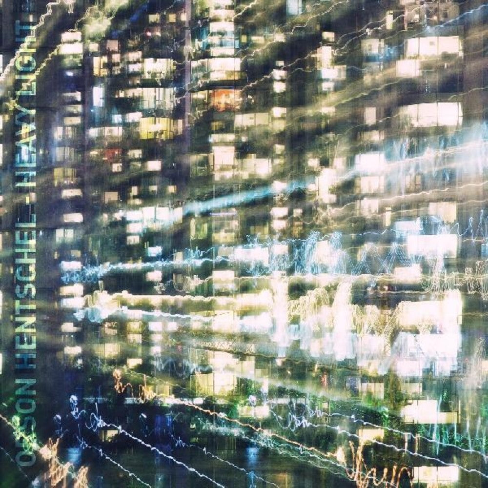 the album cover for Orson Hentschel - Heavy Light (Blue) [Clear Vinyl] [180 Gram] [Indie Exclusive] [Download Included]