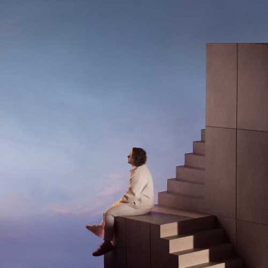 the album cover for Lewis Capaldi - Broken By Desire To Be Heavenly Sent