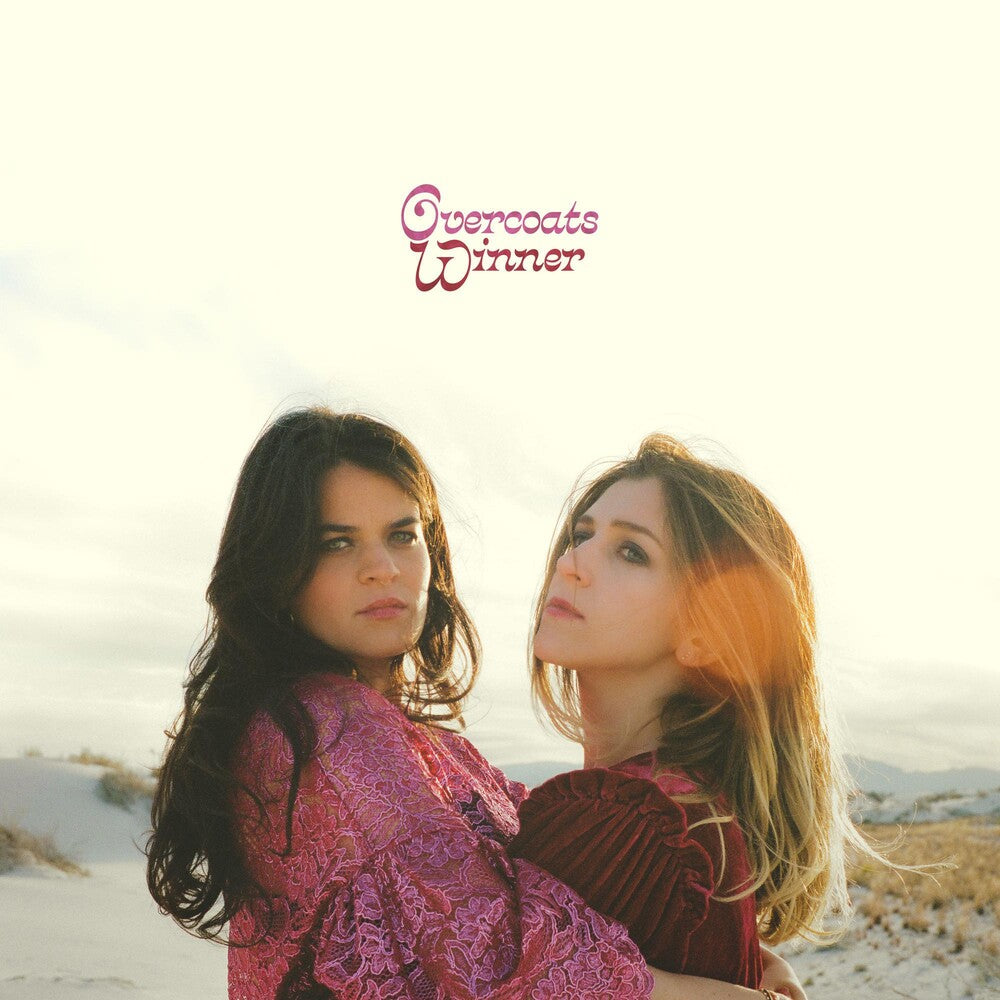 the album cover for Overcoats - Winner [Indie Exclusive Limited Edition Clear w/Black Swirl LP]
