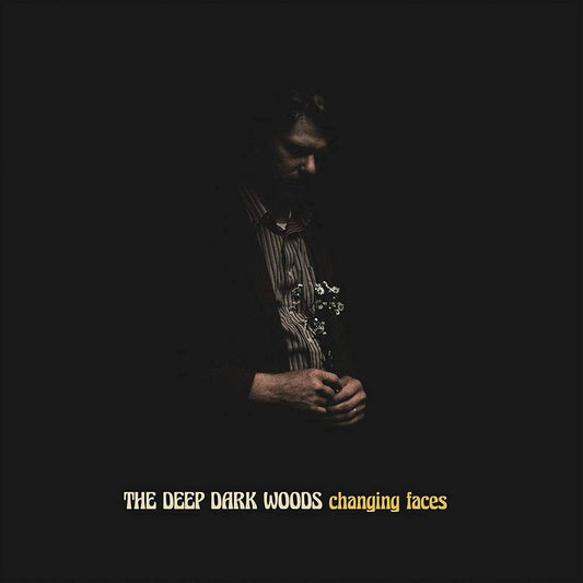 the album cover for The Deep Dark Woods - Changing Faces [Indie Exclusive Limited Edition Yellow/Black LP]