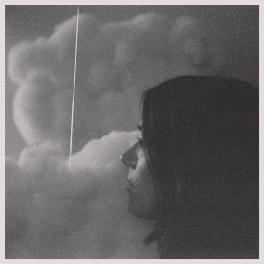 the album cover for Gia Margaret - Romantic Piano [Seaglass Wave Translucent LP]