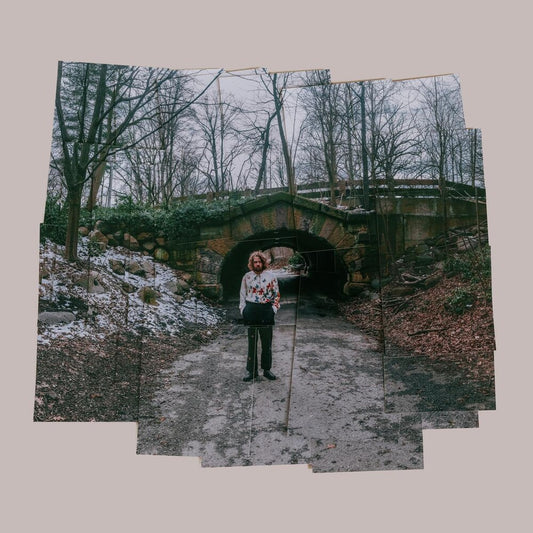 the album cover for Kevin Morby - More Photographs (A Continuum) [Coke Bottle Clear LP]