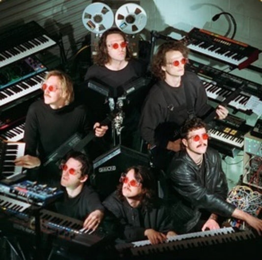 the album cover for King Gizzard & The Lizard Wizard - The Silver Cord [Indie Exclusive Limited Edition Lucky Rainbow 2 LP]