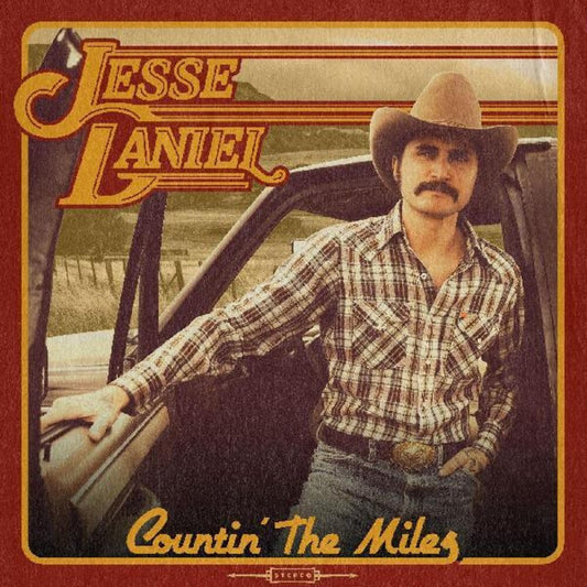 the album cover for Jessie Daniel - Countin' The Miles [Indie Exclusive Limited Edition Autographed, Transparent Camo LP]