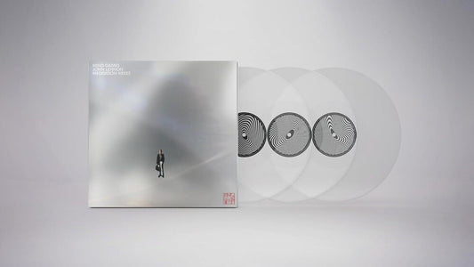 the album cover for John Lennon - Mind Games (Meditation Mixes) [Clear Vinyl] (Gate) [180 Gram]