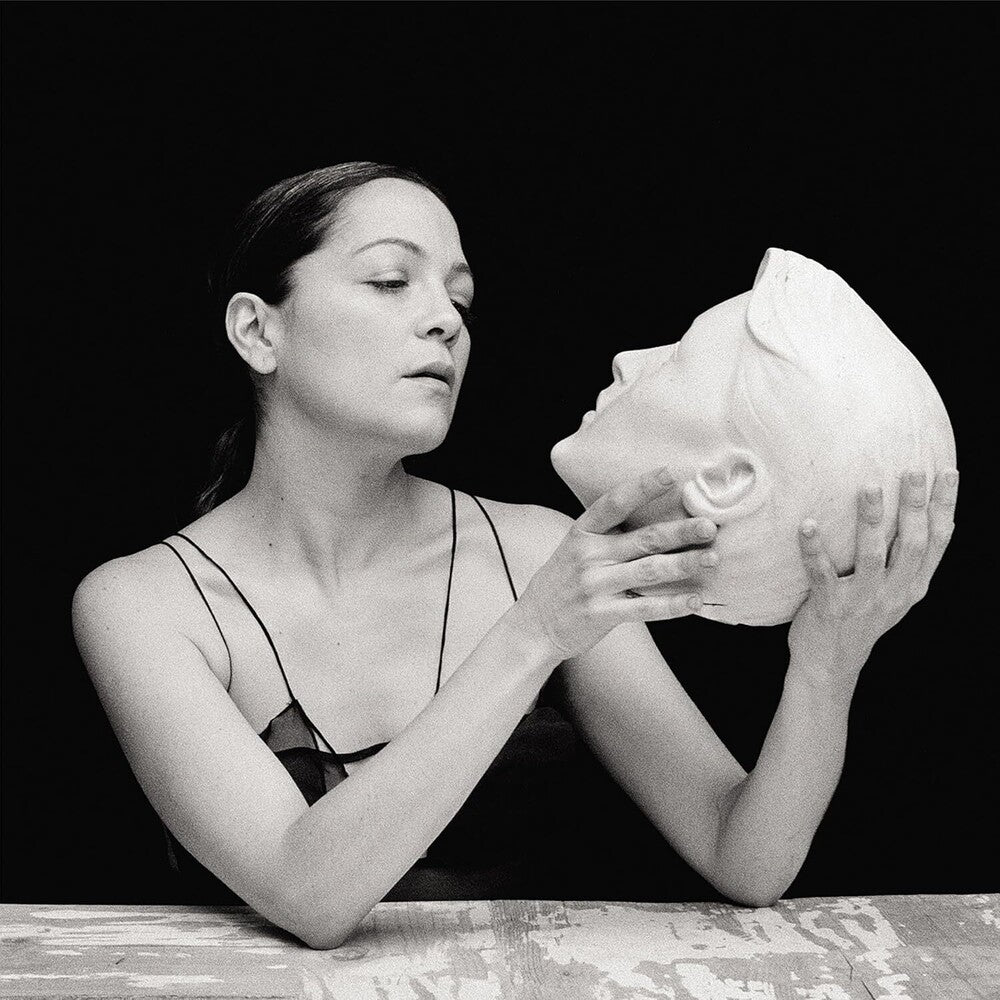 the album cover for Lafourcade, Natalia - De Todas Las Flores