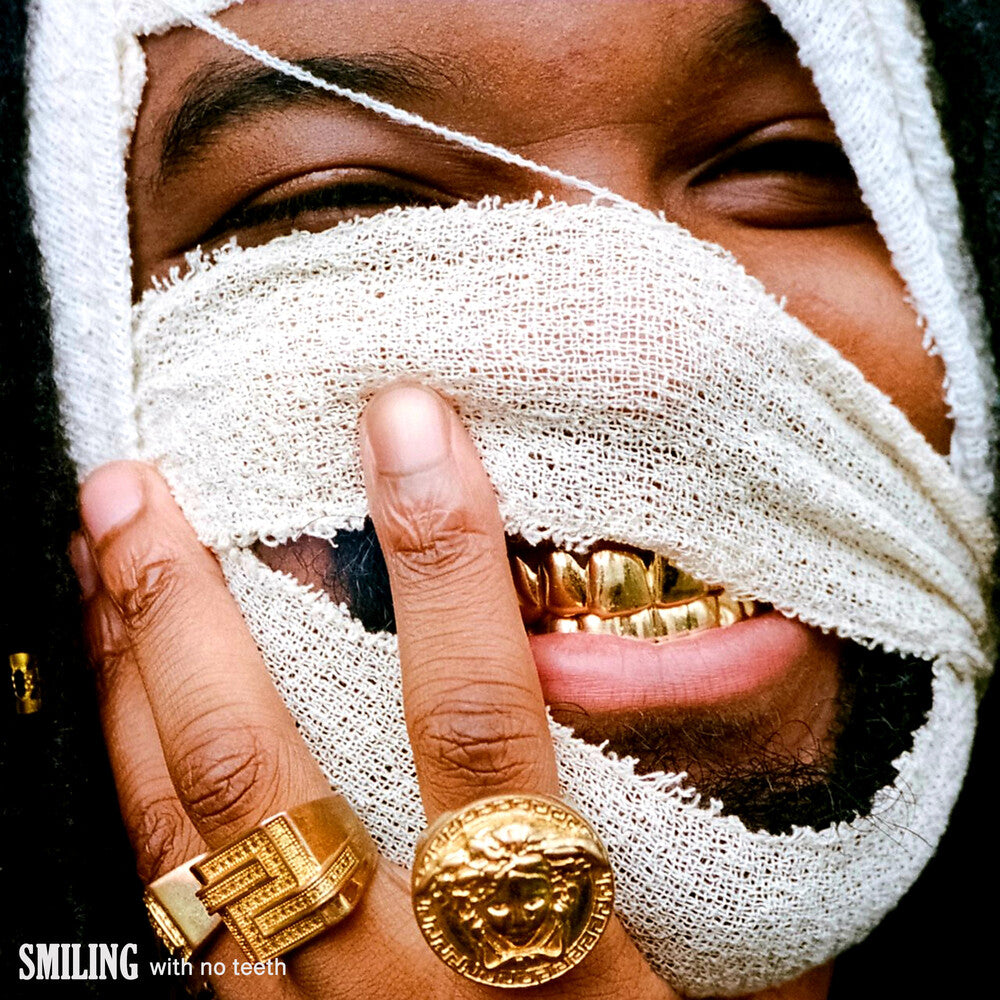 the album cover for Genesis Owusu - Smiling With No Teeth [Colored Vinyl] (Red)