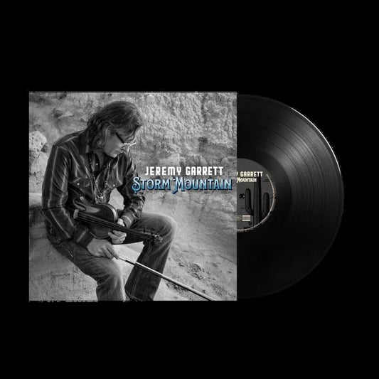 the album cover for Jeremy Garrett - Storm Mountain