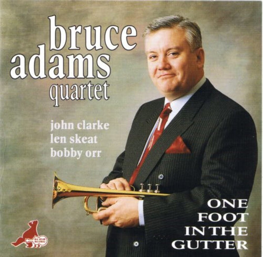 the album cover for Bruce Adams - One Foot In The Gutter