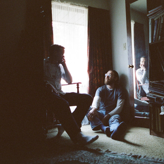 the album cover for Whitney - Small Talk [Indie Exclusive Bone Color LP]