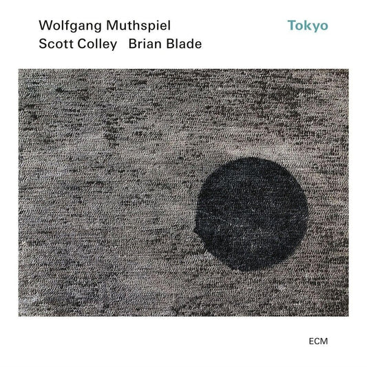 the album cover for Wolfgang Muthspiel  / Scott Colley / Brian Blade - Tokyo