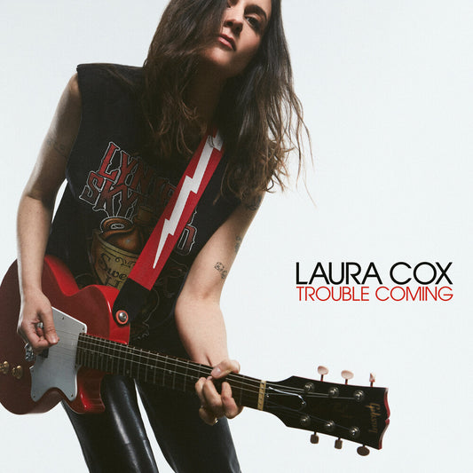 the album cover for Laura Cox - Trouble Coming (Gate)