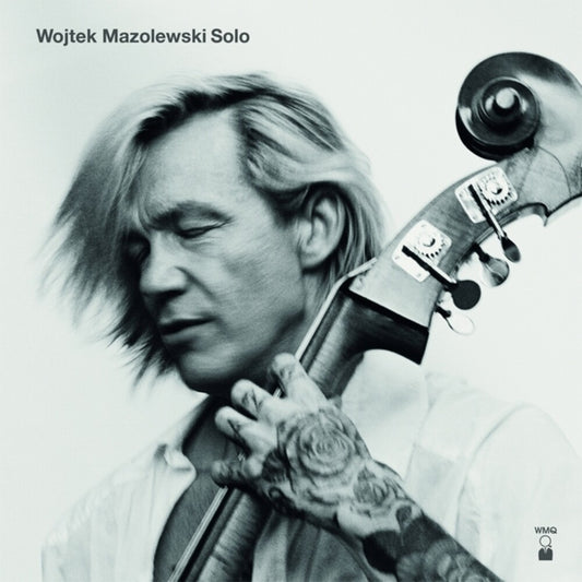 the album cover for Wojtek Mazolewski - Solo