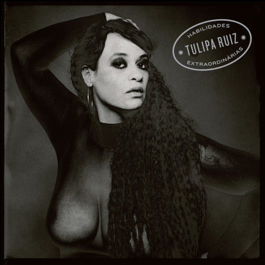 the album cover for Tulipa Ruiz - Habilidades Extraordinarias