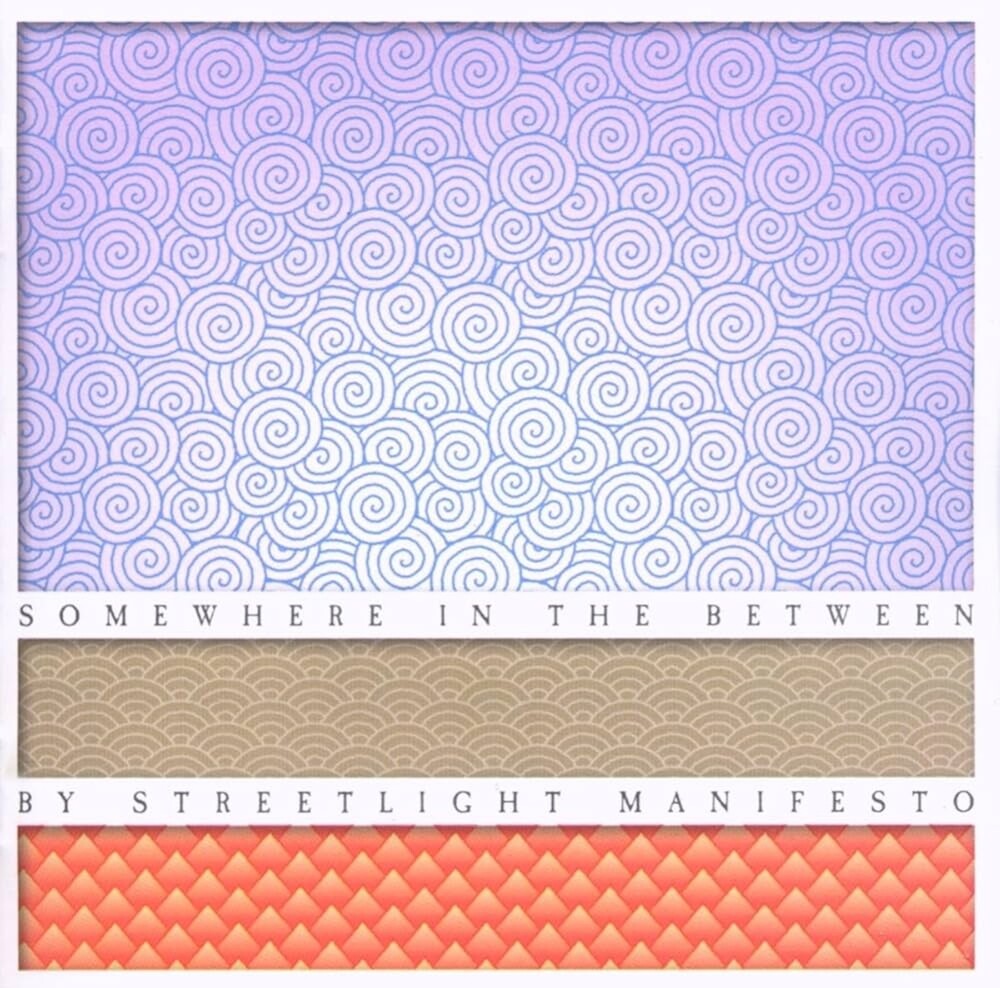 the album cover for Streetlight Manifesto - Somewhere In The Between [Indie Exclusive] [Colored Vinyl] [Indie Exclusive] [Reissue]
