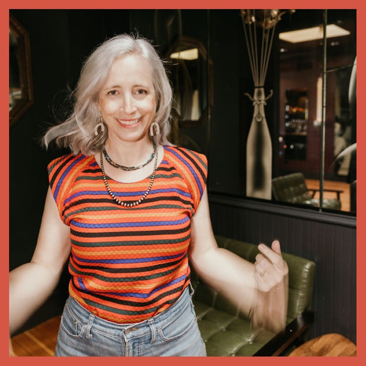 the album cover for Laura Veirs - Temple Songs - Transparent Red Vinyl [Clear Vinyl] (Red)