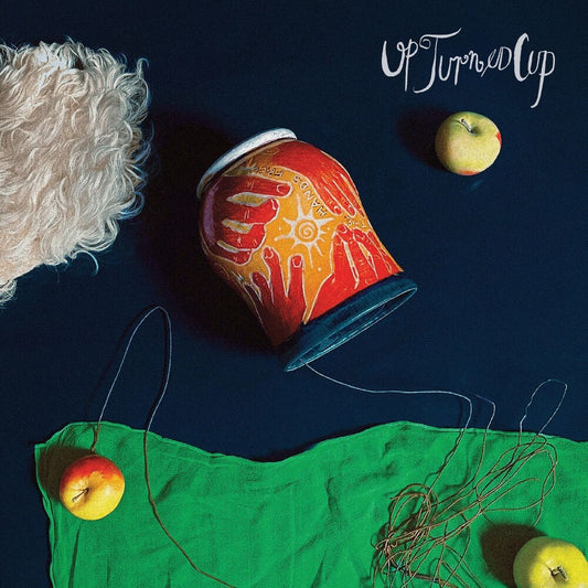 the album cover for Hands Free - Upturned Cup