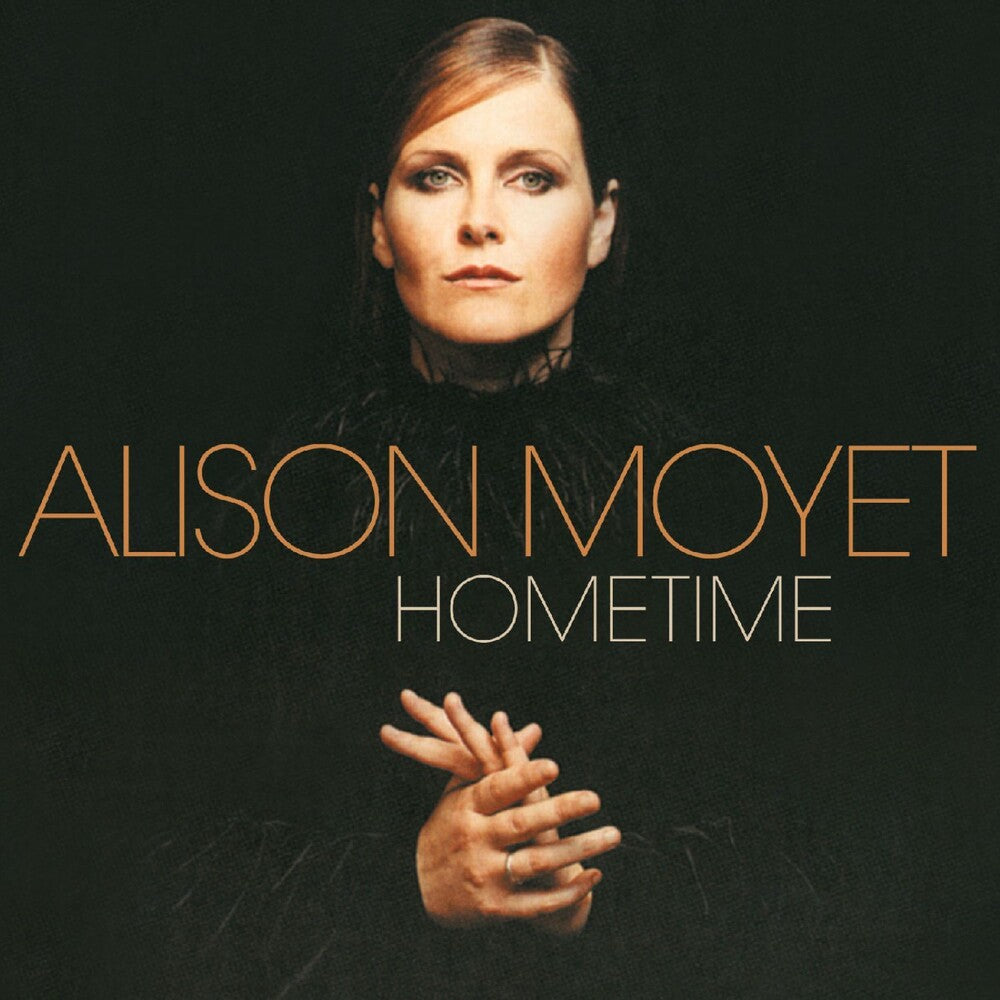 the album cover for Alison Moyet - Hometime [Crystal and Black Smoke Reissue]